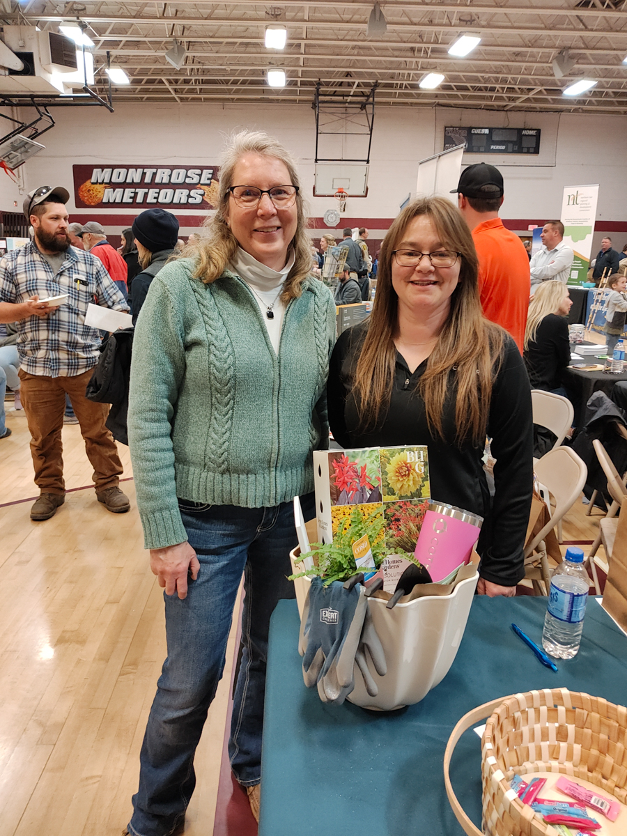 Brenda Voll of Springville (left) was the winner of a gift basket given away by Coterra Energy, represented by Bonnie Morris.
